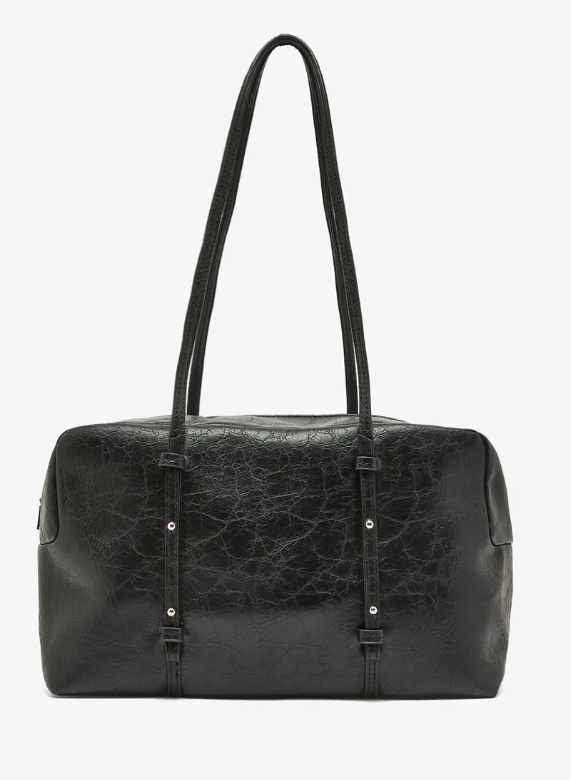 ايلا حقيبة يد من الشرق إلى الغرب